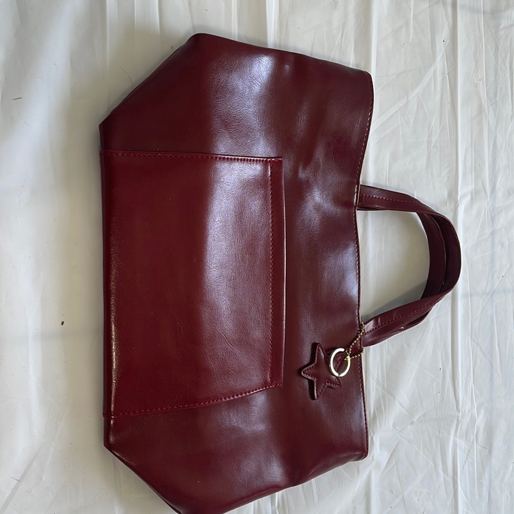 Estée Lauder womens cranberry pocketbook